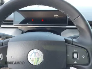 2023 Fisker Ocean Extreme z VIN VCF1EBU22PG009426, wystawiony jako IAAI lot #41963771 z przebiegiem Nie podano mil oraz . Historia ofert i sprzedaży dostępna na DreamBid. Obrazek 7.