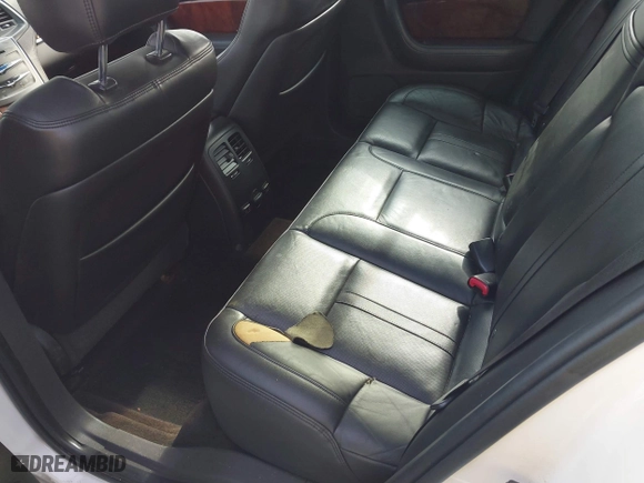 2013 Lincoln MKS with VIN 1LNHL9DK4DG611684, listed as a IAAI auction lot 42043879 with 132,866 mi miles. Bid and sale history available at carsss.com. Image 8.