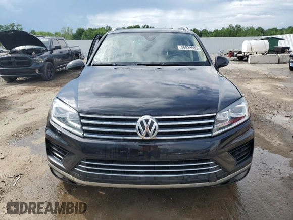 2016 Volkswagen Touareg Sport z VIN WVGEF9BP3GD008823, wystawiony jako Copart lot #56838985 z przebiegiem 49 612 mil mil oraz Nie do naprawy • Non repairable. Historia ofert i sprzedaży dostępna na DreamBid. Obrazek 5.