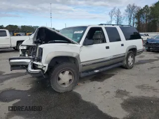 1999 GMC Suburban z VIN 1GKFK16R4XJ799550, wystawiony jako Copart lot #85567934 z przebiegiem 167 346 mil mil oraz Szkody całkowita. Historia ofert i sprzedaży dostępna na DreamBid. Obrazek 1.