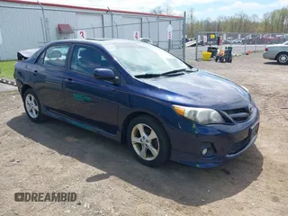 2011 Toyota Corolla L with VIN 2T1BU4EE1BC563429, listed as a IAAI auction lot 42165567 with 148,603 mi miles. Bid and sale history available at carsss.com. Image 1.