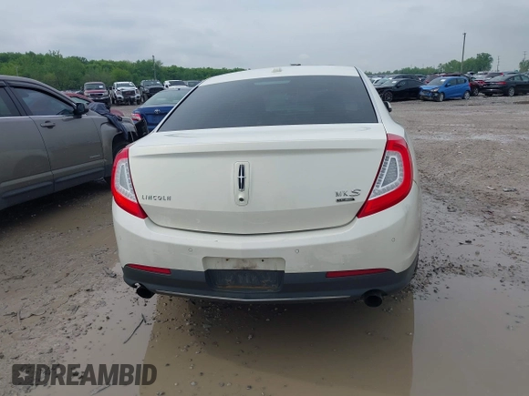 2013 Lincoln MKS EcoBoost with VIN 1LNHL9FT4DG604661, listed as a IAAI auction lot 42211781 with 134,902 mi miles and . Bid and sale history available at DreamBid. Image 16.
