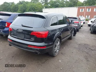 2015 Audi Q7 Premium Plus with VIN WA1LGAFEXFD028885, listed as a IAAI auction lot 42619526 with 145,126 mi miles and . Bid and sale history available at DreamBid. Image 4.