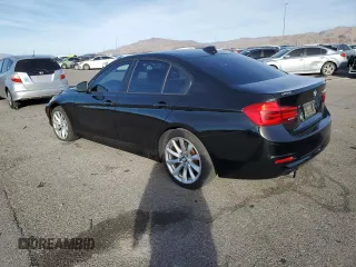 2018 BMW 3 Series 320i with VIN WBA8A9C51JAD27692, listed as a Copart auction lot 80269094 with 67,429 mi miles and Salvage Title. Bid and sale history available at carsss.com. Image 2.