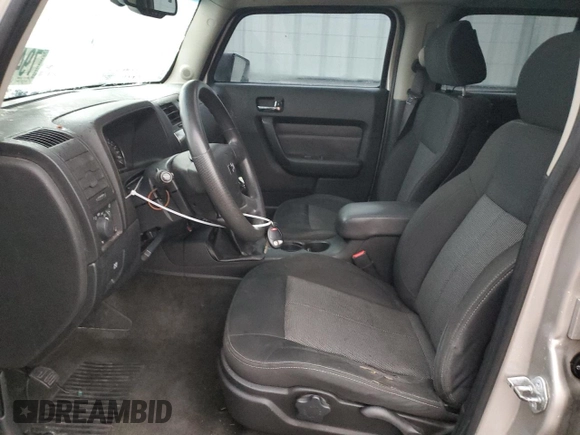 2006 Hummer H3 with VIN 5GTDN136468288973, listed as a Copart auction lot 79489784 with 144,092 mi miles and Salvage Title. Bid and sale history available at DreamBid. Image 7.