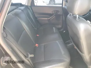 2006 Ford Focus S z VIN 1FAHP37N36W176473, wystawiony jako Copart lot #53781985 z przebiegiem 154 954 mil mil oraz Szkoda całkowita • Salvage title. Historia ofert i sprzedaży dostępna na DreamBid. Obrazek 10.