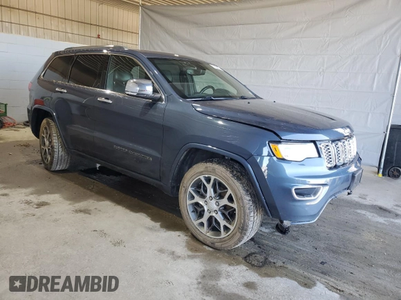 2019 Jeep Grand Cherokee Overland with VIN 1C4RJFCG2KC704332, listed as a Copart auction lot 51835855 with 47,975 mi miles and Salvage title. Bid and sale history available at DreamBid. Image 4.