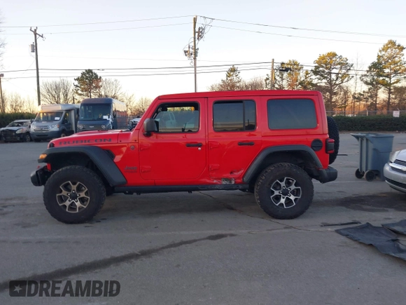 2022 Jeep Wrangler Unlimited Rubicon with VIN 1C4HJXFN4NW261809, listed as a IAAI auction lot 41459519 with 30,422 mi miles and . Bid and sale history available at DreamBid. Image 14.