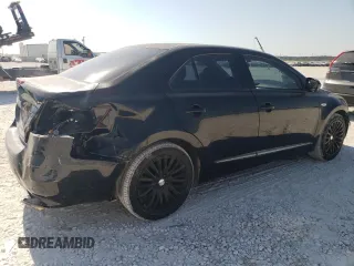 2011 Suzuki Kizashi SE z VIN JS2RE9A34B6111601, wystawiony jako Copart lot #75945784 z przebiegiem 128 926 mil mil oraz Szkoda całkowita • Salvage title. Historia ofert i sprzedaży dostępna na DreamBid. Obrazek 3.