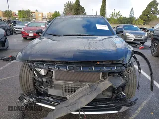 2024 Cadillac LYRIQ Luxury z VIN 1GYKPSRL6RZ120031, wystawiony jako IAAI lot #41579356 z przebiegiem 20 921 mil mil oraz . Historia ofert i sprzedaży dostępna na DreamBid. Obrazek 13.