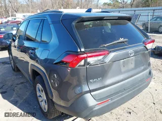 2021 Toyota RAV4 LE with VIN 2T3H1RFV9MC141966, listed as a IAAI auction lot 41328102 with 80,972 mi miles. Bid and sale history available at carsss.com. Image 3.