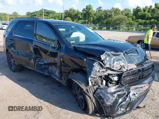 2018 Dodge Durango GT with VIN 1C4RDJDG1JC409231, listed as a IAAI auction lot 42590387 with 69,945 mi miles and . Bid and sale history available at DreamBid. Image 1.