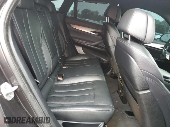 2018 BMW X6 xDrive50i with VIN 5UXKU6C5XJ0W39056, listed as a Copart auction lot 75116634 with 90,043 mi miles and Salvage Title. Bid and sale history available at carsss.com. Image 11.