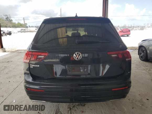 2021 Volkswagen Tiguan SE with VIN 3VV3B7AX4MM095257, listed as a Copart auction lot 60690015 with 61,782 mi miles and Salvage title. Bid and sale history available at DreamBid. Image 6.