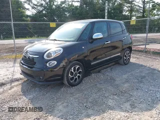 2014 FIAT 500L Lounge z VIN ZFBCFACH6EZ021783, wystawiony jako IAAI lot #42429902 z przebiegiem 129 868 mil mil oraz . Historia ofert i sprzedaży dostępna na DreamBid. Obrazek 2.