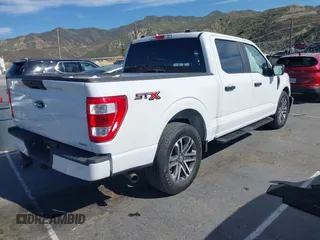 2021 Ford F-150 XL with VIN 1FTEW1CP2MKE42968, listed as a IAAI auction lot 42022454 with 32,908 mi miles. Bid and sale history available at carsss.com. Image 4.