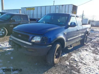 1998 Ford F-150 Standard with VIN 1FTZX18WXWNB31384, listed as a IAAI auction lot 41246304 with 163,877 mi miles. Bid and sale history available at carsss.com. Image 2.