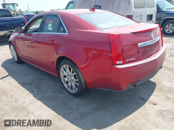 2012 Cadillac CTS Premium with VIN 1G6DS5E34C0132696, listed as a IAAI auction lot 42562931 with 83,025 mi miles and . Bid and sale history available at DreamBid. Image 3.