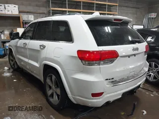 2015 Jeep Grand Cherokee Overland with VIN 1C4RJFCG2FC741015, listed as a IAAI auction lot 41607606 with 132,038 mi miles and . Bid and sale history available at DreamBid. Image 3.