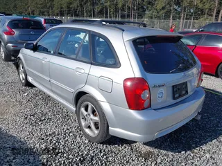 2002 Mazda Protege z VIN JM1BJ246221493337, wystawiony jako IAAI lot #42171966 z przebiegiem 244 609 mil mil oraz . Historia ofert i sprzedaży dostępna na DreamBid. Obrazek 3.