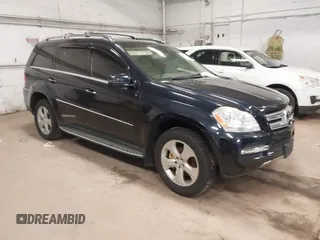 2011 Mercedes-Benz GL-Class GL 450 with VIN 4JGBF7BE4BA664500, listed as a IAAI auction lot 42099521 with 140,232 mi miles. Bid and sale history available at carsss.com. Image 1.