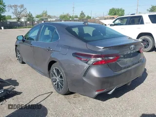 2023 Toyota Camry SE with VIN 4T1G11AK5PU163629, listed as a IAAI auction lot 42262131 with 47,617 mi miles and . Bid and sale history available at DreamBid. Image 3.
