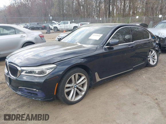 2016 BMW 7 Series 750i xDrive with VIN WBA7F2C58GG418482, listed as a IAAI auction lot 41931831 with 97,776 mi miles and . Bid and sale history available at DreamBid. Image 16.