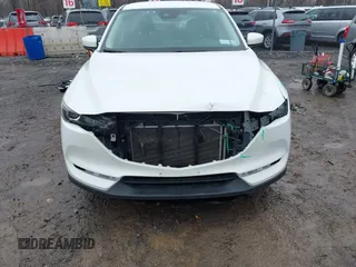 2019 Mazda CX-5 Sport with VIN JM3KFBBM2K0629966, listed as a IAAI auction lot 41953702 with 48,496 mi miles and . Bid and sale history available at DreamBid. Image 6.