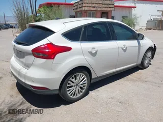 2016 Ford Focus Titanium with VIN 1FADP3N27GL319497, listed as a IAAI auction lot 42385359 with Not provided miles and . Bid and sale history available at DreamBid. Image 4.