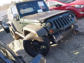 2010 Jeep Wrangler Sport with VIN 1J4AA2D16AL212492, listed as a IAAI auction lot 41656955 with 225,718 mi miles and . Bid and sale history available at carsss.com. Image 1.