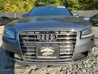 2015 Audi A8 with VIN WAUJGAFD3FN013026, listed as a Copart auction lot 67650374 with 88,064 mi miles and Salvage title. Bid and sale history available at DreamBid. Image 5.