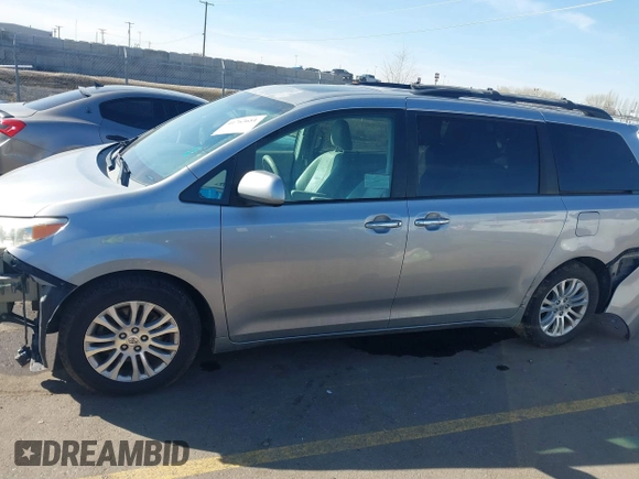 2011 Toyota Sienna XLE AAS with VIN 5TDYK3DC4BS014986, listed as a IAAI auction lot 41763681 with 169,619 mi miles. Bid and sale history available at carsss.com. Image 15.