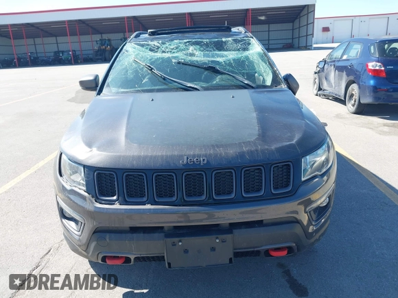 2019 Jeep Compass Trailhawk with VIN 3C4NJDDB0KT619337, listed as a IAAI auction lot 42171160 with 63,869 mi miles and . Bid and sale history available at DreamBid. Image 12.