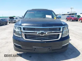 2015 Chevrolet Tahoe LTZ with VIN 1GNSCCKC4FR309152, listed as a IAAI auction lot 42029341 with 187,313 mi miles and . Bid and sale history available at DreamBid. Image 12.
