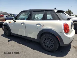 2017 MINI Hardtop 4 Door Cooper with VIN WMWXU1C32H2F77790, listed as a Copart auction lot 62352415 with 71,661 mi miles and Salvage title. Bid and sale history available at DreamBid. Image 2.