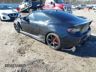2014 Scion FR-S z VIN JF1ZNAA14E9708590, wystawiony jako IAAI lot #41278089 z przebiegiem 117 357 mil mil oraz . Historia ofert i sprzedaży dostępna na DreamBid. Obrazek 3.