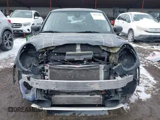 2020 MINI Hardtop Cooper S z VIN WMWXR5C07L2L60692, wystawiony jako IAAI lot #41621462 z przebiegiem 66 898 mil mil oraz . Historia ofert i sprzedaży dostępna na DreamBid. Obrazek 13.