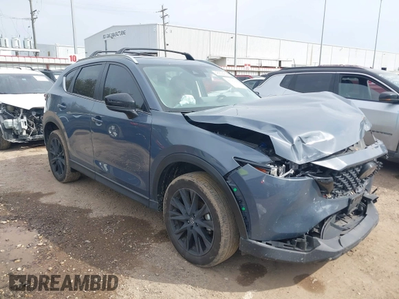 2023 Mazda CX-5 S Carbon Edition z VIN JM3KFBCM6P0288402, wystawiony jako IAAI lot #41682386 z przebiegiem 30 482 mil mil oraz . Historia ofert i sprzedaży dostępna na DreamBid. Obrazek 1.
