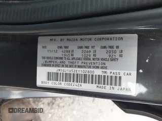 2014 Mazda 6 i Sport with VIN JM1GJ1U52E1102800, listed as a IAAI auction lot 42266283 with 103,886 mi miles and . Bid and sale history available at DreamBid. Image 9.
