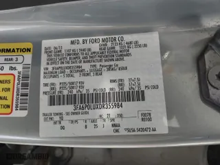 2013 Ford Fusion SE Hybrid with VIN 3FA6P0LUXDR355984, listed as a IAAI auction lot 41977367 with 244,310 mi miles. Bid and sale history available at carsss.com. Image 9.