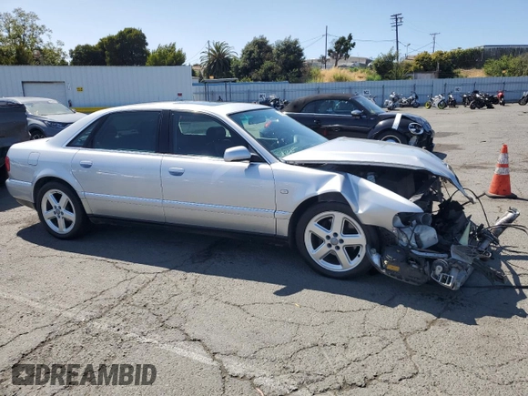 2002 Audi A8 with VIN WAUML44D62N008295, listed as a Copart auction lot 61276095 with 232,635 mi miles and Salvage title. Bid and sale history available at DreamBid. Image 4.