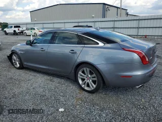 2015 Jaguar XJ Portfolio with VIN SAJWJ2GD2F8V75238, listed as a Copart auction lot 73633984 with 102,545 mi miles and Salvage title. Bid and sale history available at DreamBid. Image 2.