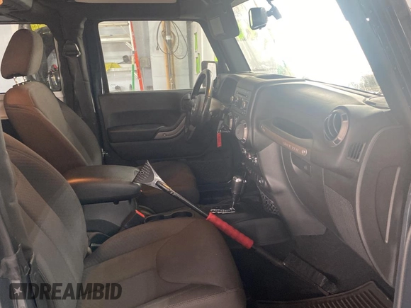 2017 Jeep Wrangler Willys Wheeler with VIN 1C4AJWAGXHL602088, listed as a Copart auction lot 45524745 with 101,847 mi miles and Clean Title. Bid and sale history available at DreamBid. Image 5.