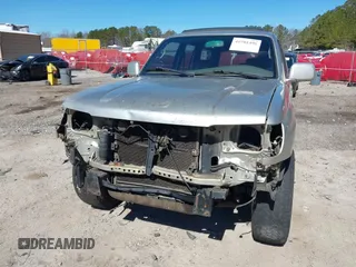 1999 Toyota 4Runner SR5 with VIN JT3GN86R7X0097975, listed as a IAAI auction lot 41701496 with 316,799 mi miles and . Bid and sale history available at DreamBid. Image 6.