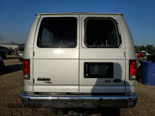 2009 Ford Econoline Passenger XL with VIN 1FMNE11L29DA55878, listed as a Copart auction lot 74945294 with 75,086 mi miles and Salvage title. Bid and sale history available at DreamBid. Image 6.