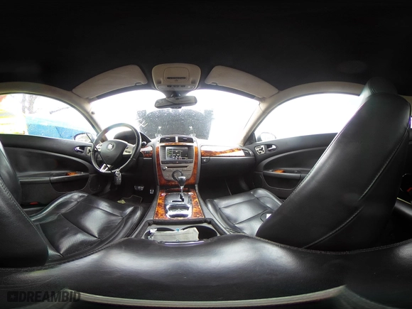 2008 Jaguar XK with VIN SAJWA43C889B21570, listed as a IAAI auction lot 42082547 with 99,783 mi miles. Bid and sale history available at carsss.com. Image 19.