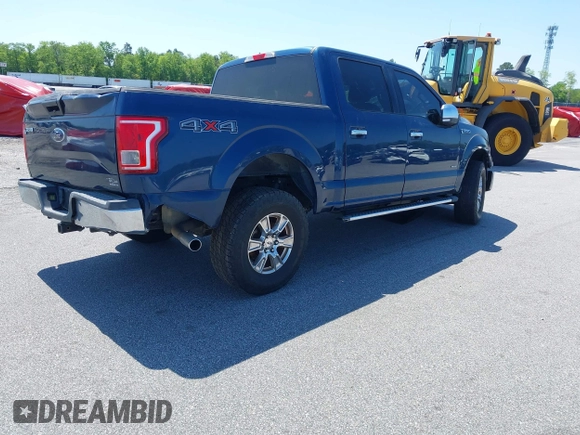 2015 Ford F-150 XLT with VIN 1FTEW1EP3FKF22540, listed as a IAAI auction lot 39565229 with 127,825 mi miles. Bid and sale history available at carsss.com. Image 4.