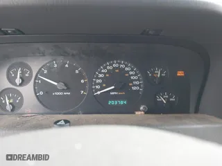 1999 Jeep Grand Cherokee Laredo with VIN 1J4GW58N4XC676836, listed as a IAAI auction lot 41799381 with 203,784 mi miles. Bid and sale history available at carsss.com. Image 7.