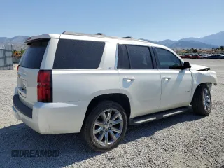 2015 Chevrolet Tahoe LT z VIN 1GNSCBKC4FR678751, wystawiony jako Copart lot #59235935 z przebiegiem 108 296 mil mil oraz Szkoda całkowita • Salvage title. Historia ofert i sprzedaży dostępna na DreamBid. Obrazek 3.