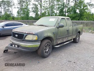 2001 Ford F-150 XL z VIN 1FTRX17L21NA34986, wystawiony jako IAAI lot #42334380 z przebiegiem Nie podano mil oraz . Historia ofert i sprzedaży dostępna na DreamBid. Obrazek 2.